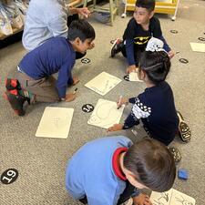 Hands on math in K/1 room - write the numbers on the floor