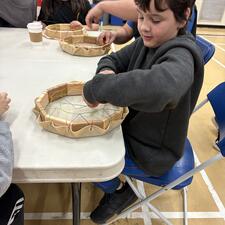 students work on their drums